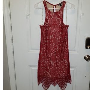 Lace dress with detailed bottom.